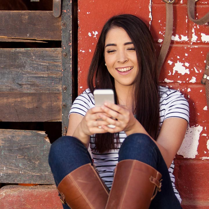 A young lady using a smartphone